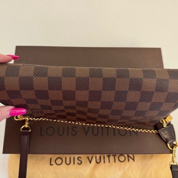 Louis Vuitton Damier Eva pochette with Strap. - Picture 3 of 10